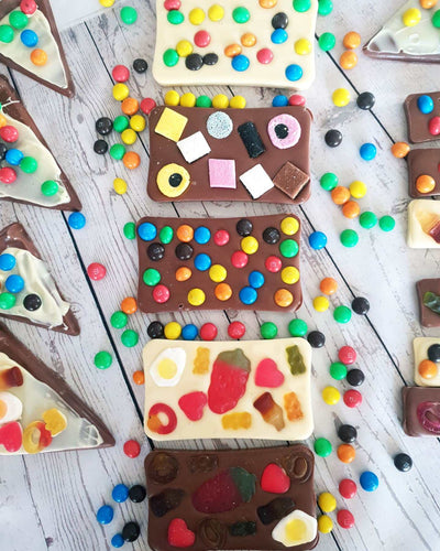 Handmade artisan white chocolate bar with crispy M&Ms.